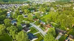 suburban-neighborhood-forested-green-trees-lawns-us-village-with-fences-sheds_50.jpg